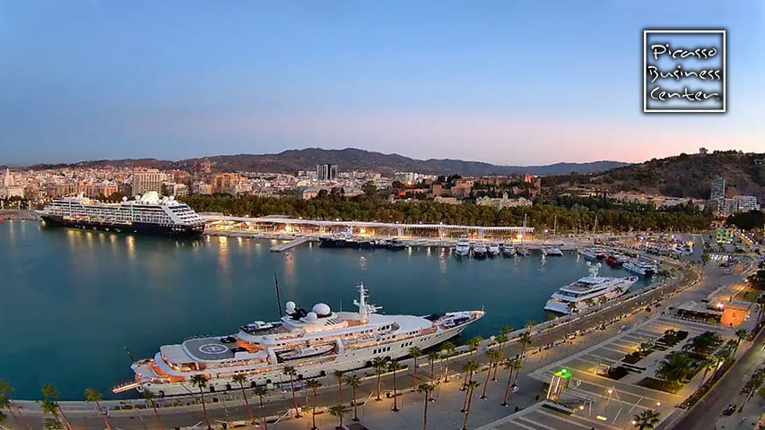 Container ships Balearia, MSC, Cosco, Maersk, CMA CGM and Hapag-Lloyd unloading cargo at the seaport of Malaga
