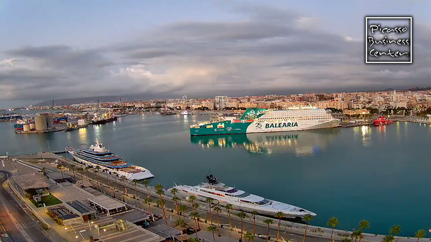 Container ships Balearia, MSC, Cosco, Maersk, CMA CGM and Hapag-Lloyd unloading cargo at the seaport of Malaga