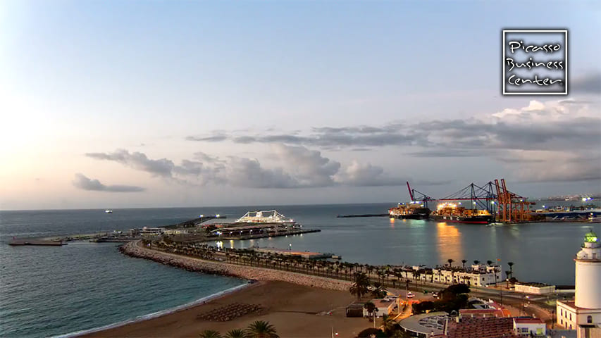Container ships Balearia, MSC, Cosco, Maersk, CMA CGM and Hapag-Lloyd unloading cargo at the seaport of Malaga